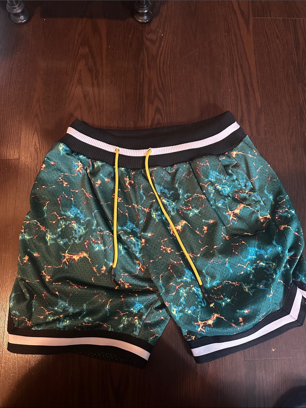 Certified Reserve brand men’s green lightning shorts